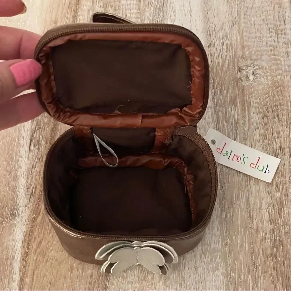 NWT Claire’s metallic brown little zipper jewelry train case with 3D Butterfly